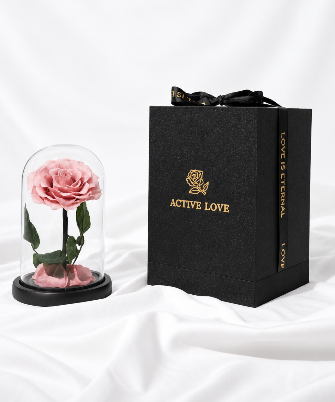 Luxury pink forever rose preserved under a glass dome an elegant everlasting rose gift for anniversaries, birthdays and romantic occasions, available with flower delivery in Abu Dhabi and Dubai, UAE.