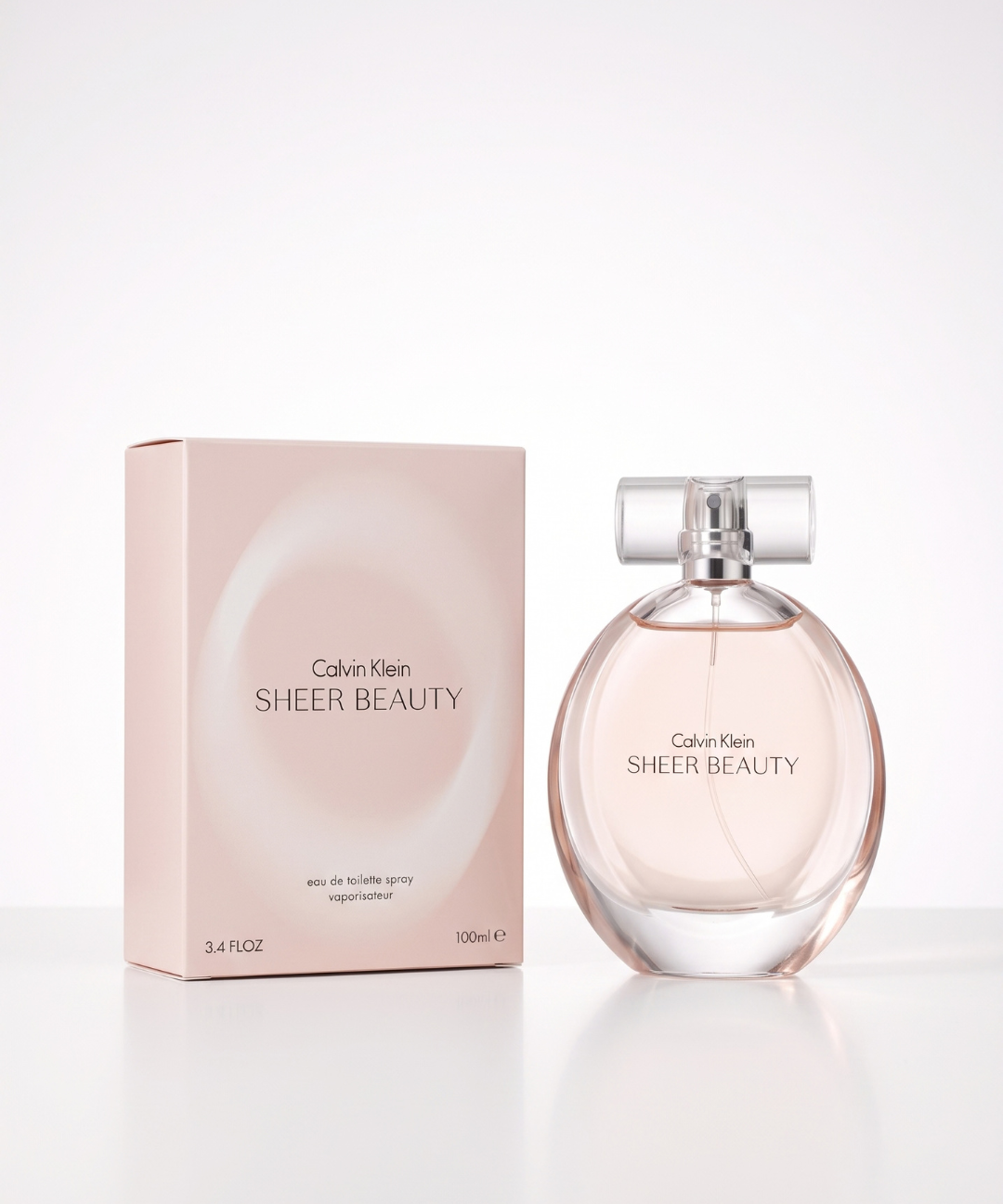 Calvin Klein Sheer Beauty EDT for Women 100ml, elegant oval glass perfume bottle with a transparent cap and soft blush pink fragrance, ideal for everyday wear, available in Abu Dhabi, Dubai and across the UAE.