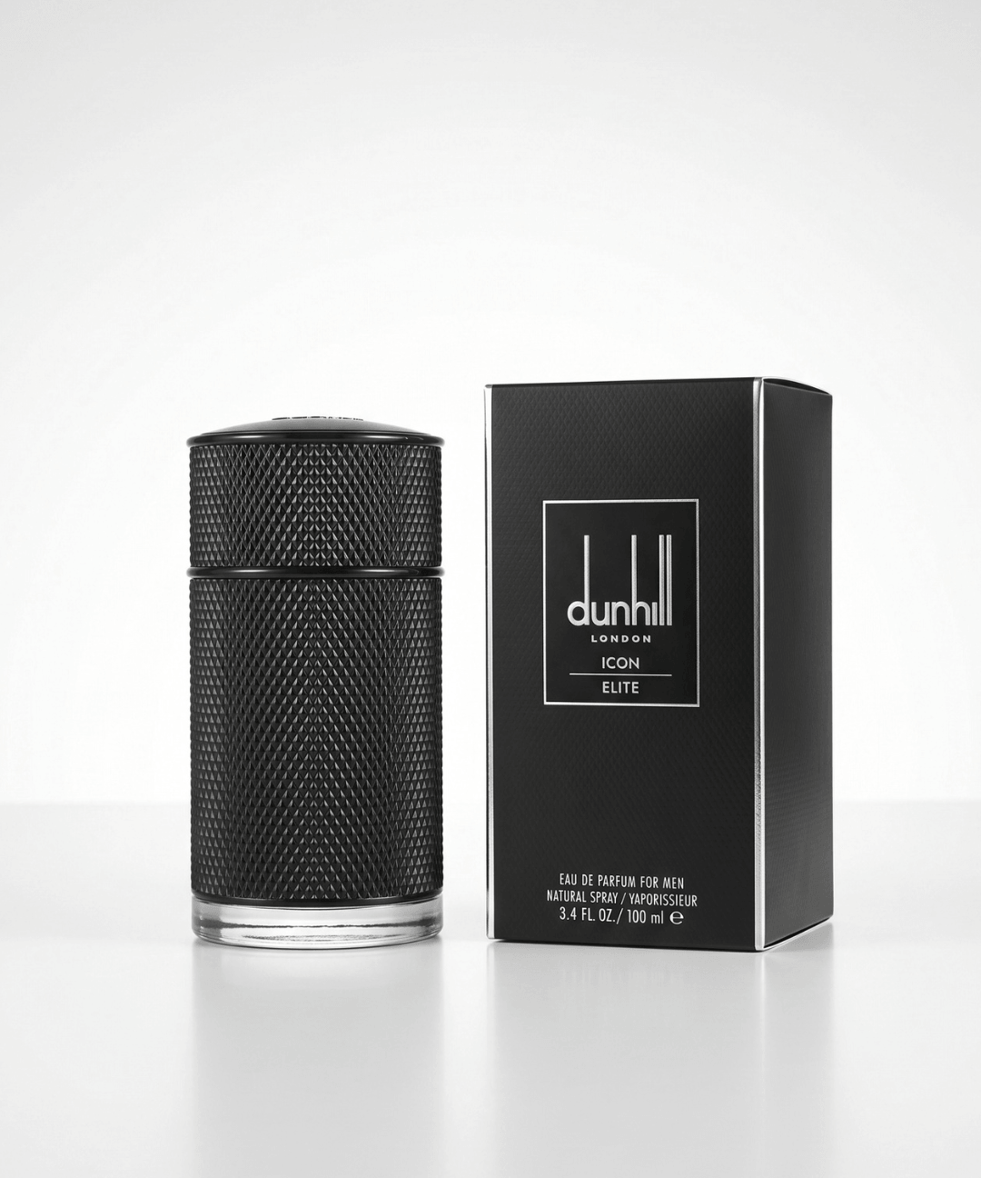Dunhill London Icon Elite Eau de Parfum for Men 100ml, featuring a black textured cylindrical perfume bottle with silver accents and matching black packaging, available for men's luxury perfume shopping in Abu Dhabi, Dubai and across the UAE.