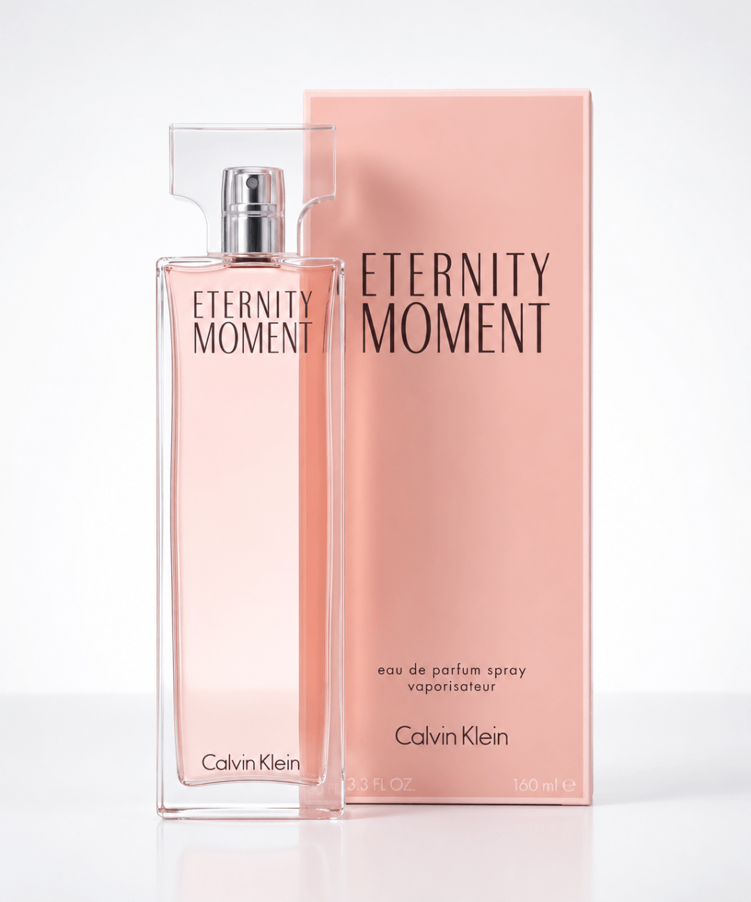 Calvin Klein Eternity Moment Eau de Parfum for Women, featuring an elegant rectangular glass perfume bottle with a soft pink fragrance and transparent cap, available for women's perfume shopping in Abu Dhabi, Dubai and across the UAE.