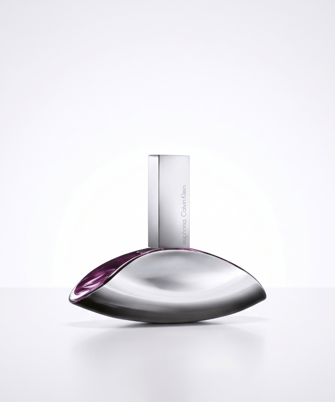 Calvin Klein Euphoria Eau de Parfum for Women 100ml, featuring an elegant silver leaf-shaped perfume bottle with deep purple accents and matching burgundy packaging, available for women's designer perfume shopping in Abu Dhabi, Dubai and across the UAE.