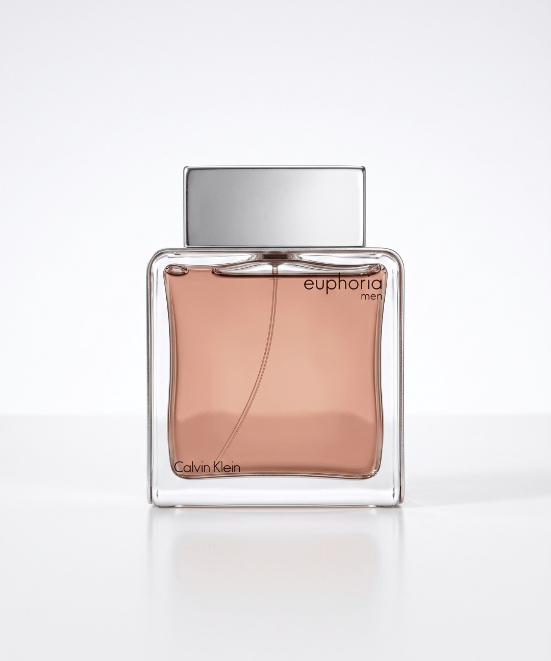 Calvin Klein Euphoria Men Eau de Toilette, featuring a sophisticated rectangular glass perfume bottle with warm amber-brown fragrance and a silver cap, available for men's designer perfume shopping in Abu Dhabi, Dubai and across the UAE.