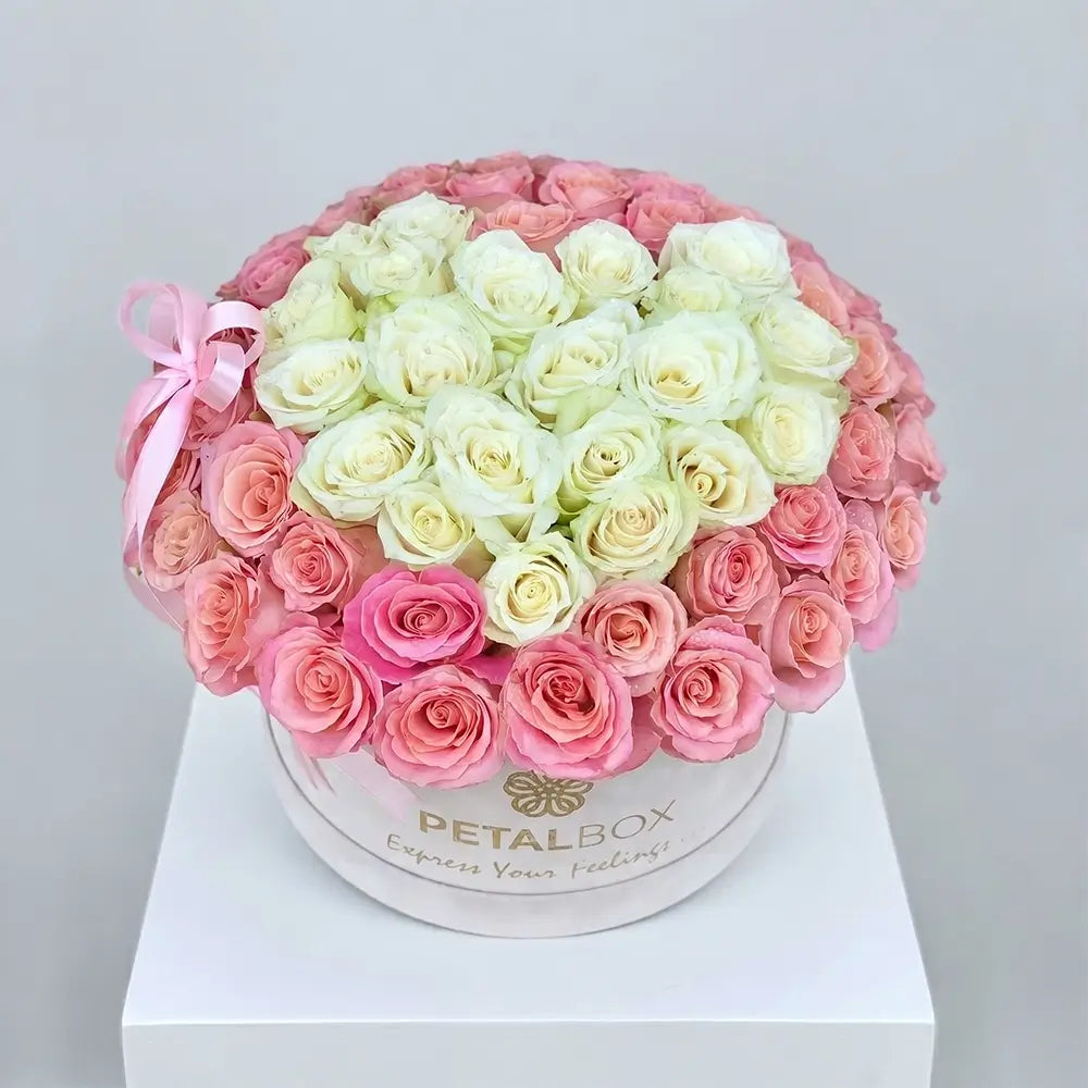 Luxury heart-shaped rose flower box arrangement with white and pink roses in a premium Petal Box, designed for romantic gifting and special occasions in Dubai and Abu Dhabi.