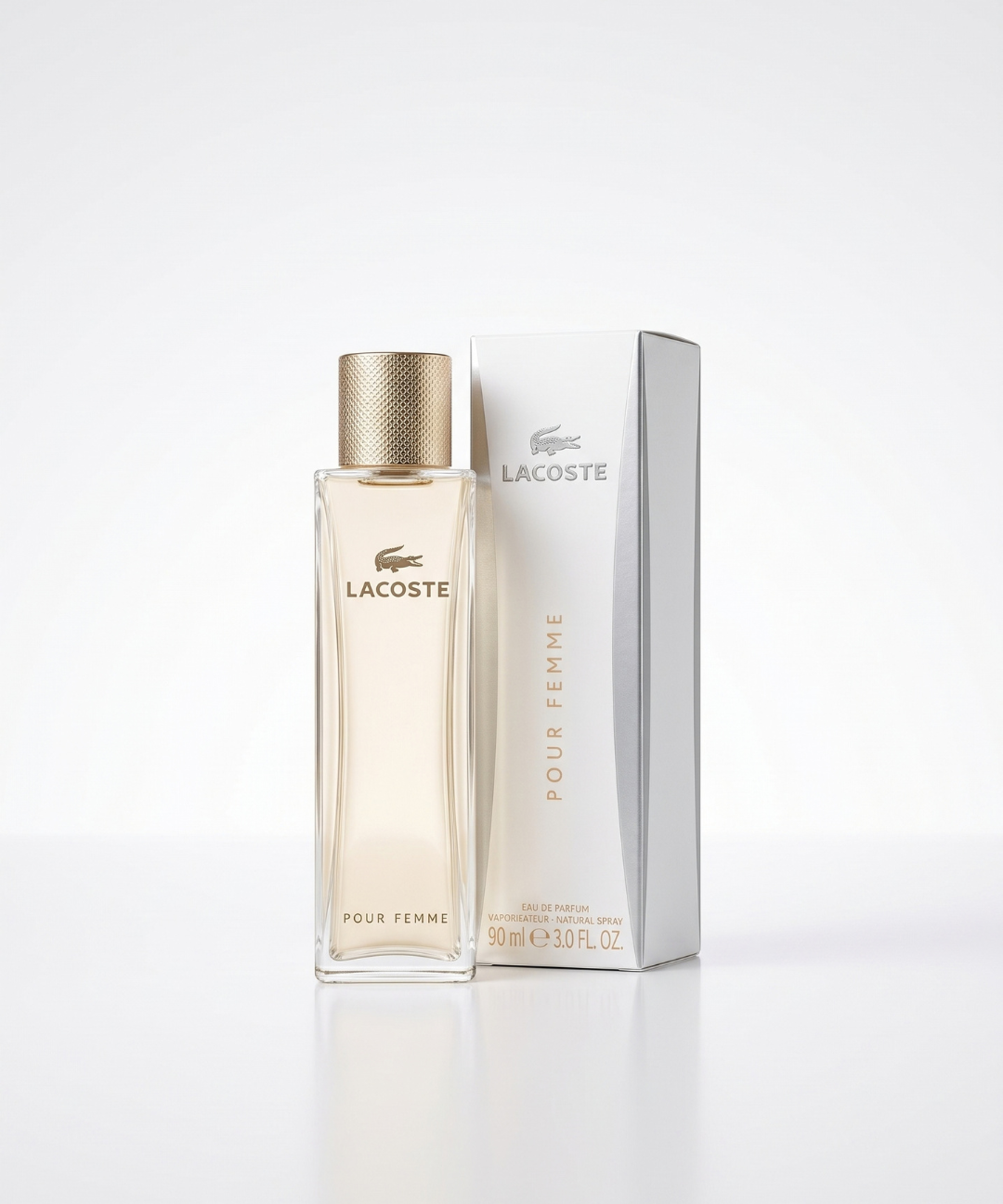 Lacoste Pour Femme Eau de Parfum for Women 90ml, featuring an elegant slim glass perfume bottle with a gold textured cap and matching silver packaging, available for women's designer perfume shopping in Abu Dhabi, Dubai and across the UAE.