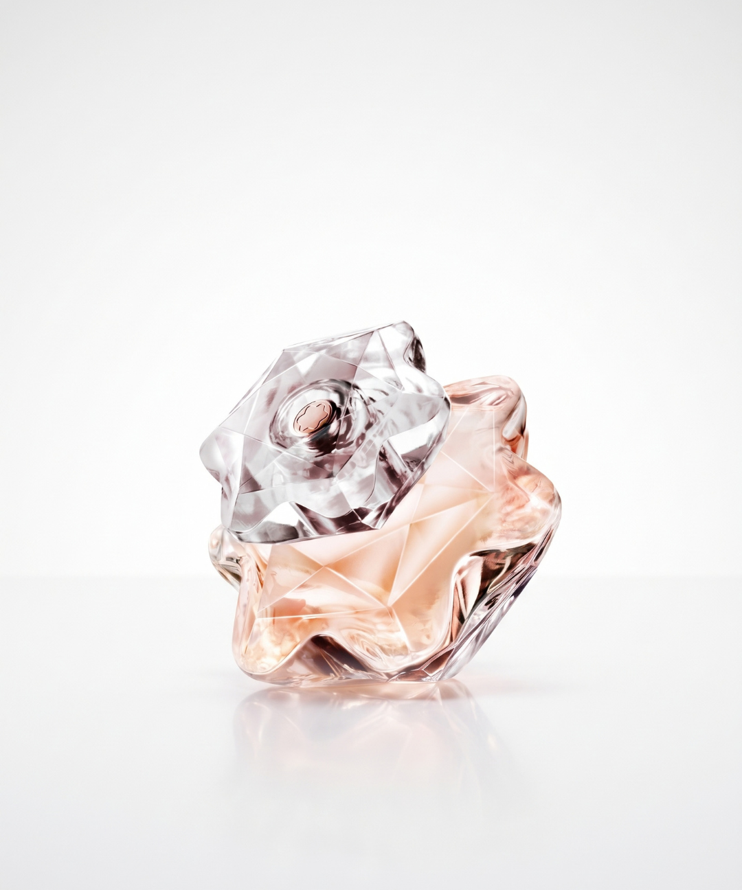 Montblanc Lady Emblem Eau de Parfum for Women 50ml, featuring a faceted blush pink crystal-shaped perfume bottle with matching elegant packaging, available for women's luxury perfume shopping in Abu Dhabi, Dubai and across the UAE.