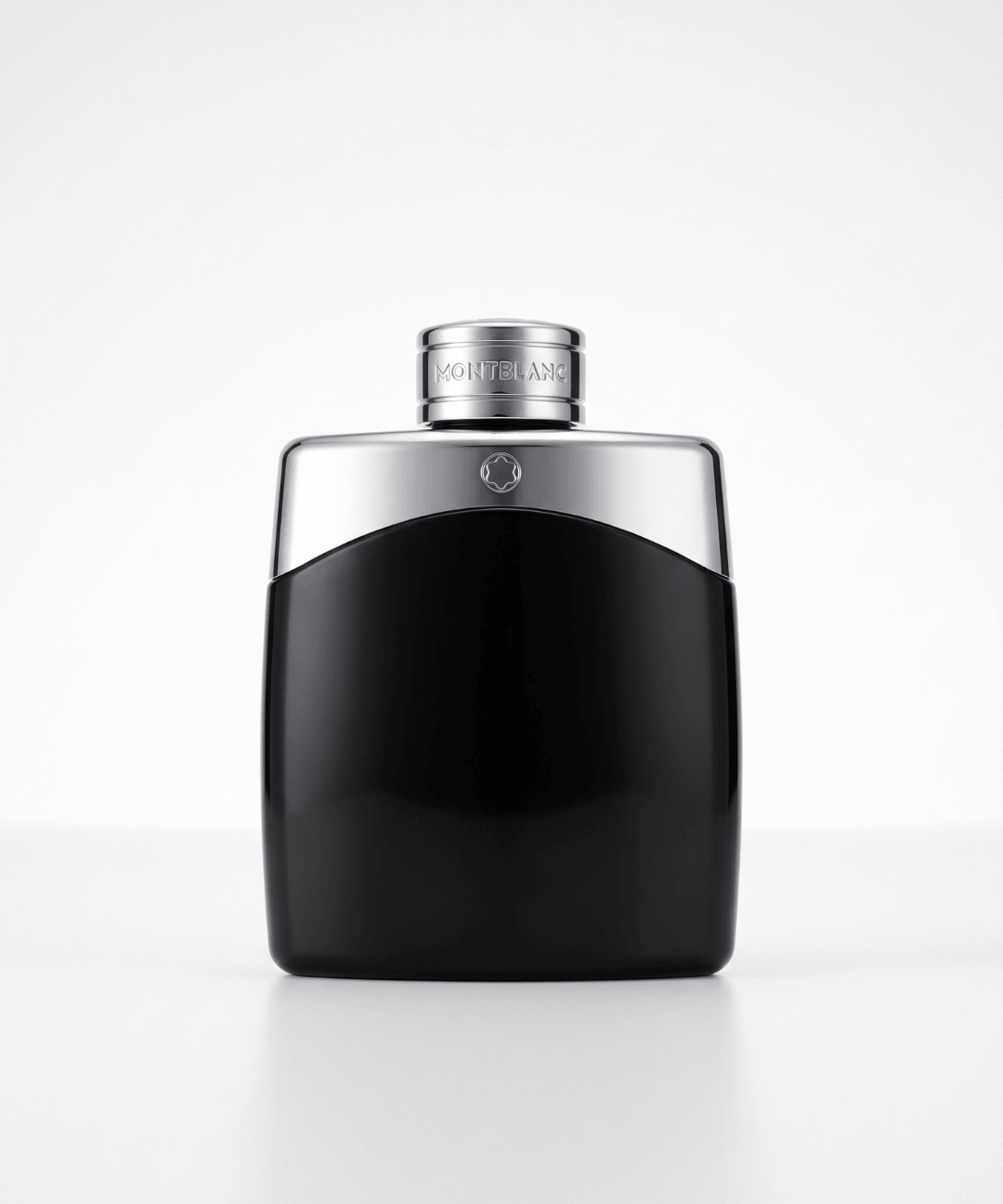 Montblanc Legend Eau de Toilette for Men 100ml, featuring a sleek black perfume bottle with a silver metallic cap and matching black packaging with silver stripe detailing, available for men's designer perfume shopping in Abu Dhabi, Dubai and across the UAE.