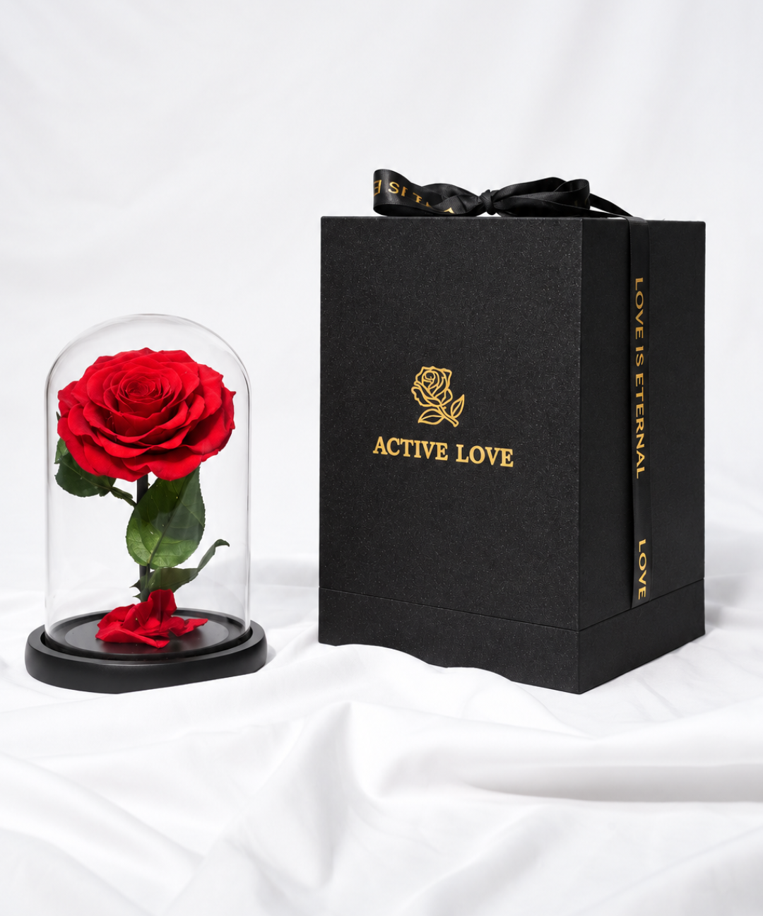Luxury red forever rose preserved under a clear glass dome an everlasting red rose gift for anniversaries, Valentine's Day and romantic occasions, with flower gifting delivery in Abu Dhabi and Dubai, UAE.