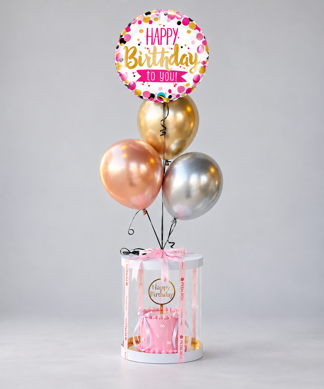 pink birthday cake gift box with balloons transparent box abu dhabi dubai delivery