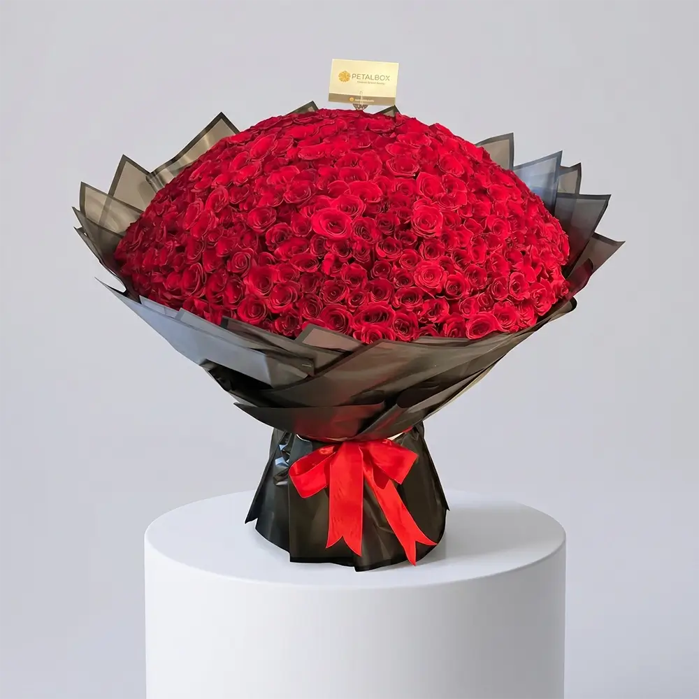 Luxury 400 red rose bouquet with premium black wrapping and elegant red ribbon, featuring an extravagant dome arrangement of fresh red roses for grand romantic gifting and luxury occasions.