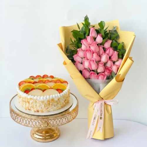 fresh fruit cake with pink rose bouquet gift set, luxury birthday flowers and cake combo by Petal Box UAE, premium gift delivery in Abu Dhabi and Dubai