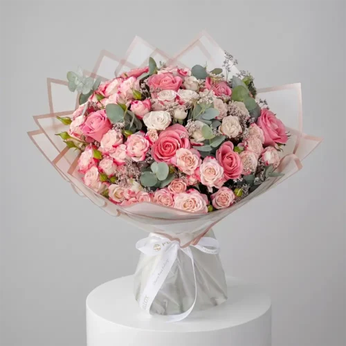 luxury pink and white rose bouquet with premium roses, spray roses and eucalyptus in elegant wrapping, romantic floral arrangement by Petal Box UAE for flower delivery in Abu Dhabi and Dubai