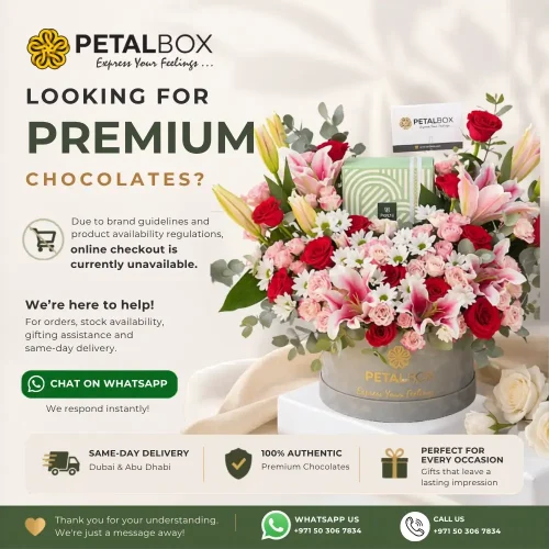 Promotional banner for PetalBox featuring a luxury flower arrangement in a gray hatbox with pink lilies, red roses, white daisies, eucalyptus, and a green Patchi chocolate gift box. Text says “Looking for Patchi Chocolates?” and notes online checkout is unavailable due to brand guidelines and product availability regulations. Customers are encouraged to order via WhatsApp for stock availability, gifting assistance, and same-day delivery. Highlights include same-day delivery in Dubai and Abu Dhabi, 100% authentic premium Patchi chocolates, and gifts for every occasion. Contact number shown: +971 50 306 7834.