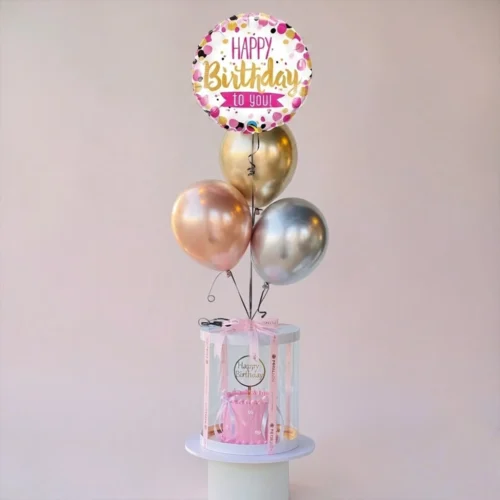 pink birthday cake gift box with balloons transparent box abu dhabi dubai delivery