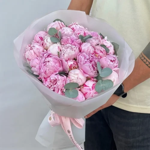 Luxury pink peony flower bouquet with eucalyptus leaves and white wrapping by Petal Box UAE