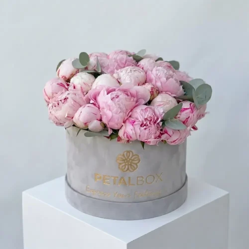 Luxury pink peony flower hat box with eucalyptus leaves by Petal Box UAE