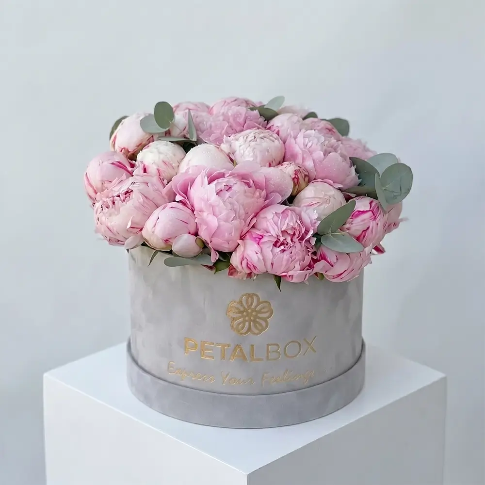 Luxury pink peony flower hat box with eucalyptus leaves by Petal Box UAE