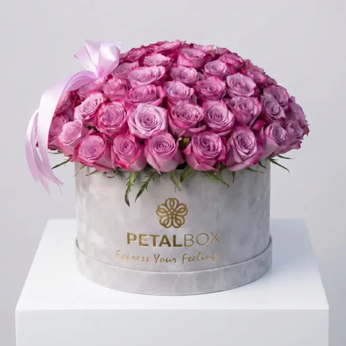 Luxury purple rose flower box arrangement with fresh lavender roses in a premium velvet Petal Box, styled for elegant gifting in Abu Dhabi and Dubai.