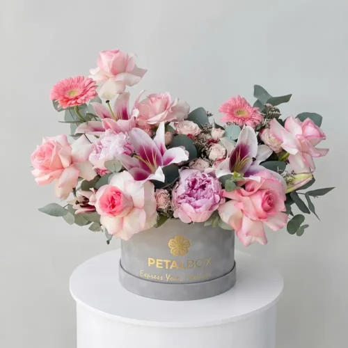 Luxury pink peony and rose hat box with lilies, gerberas, and eucalyptus by Petal Box UAE